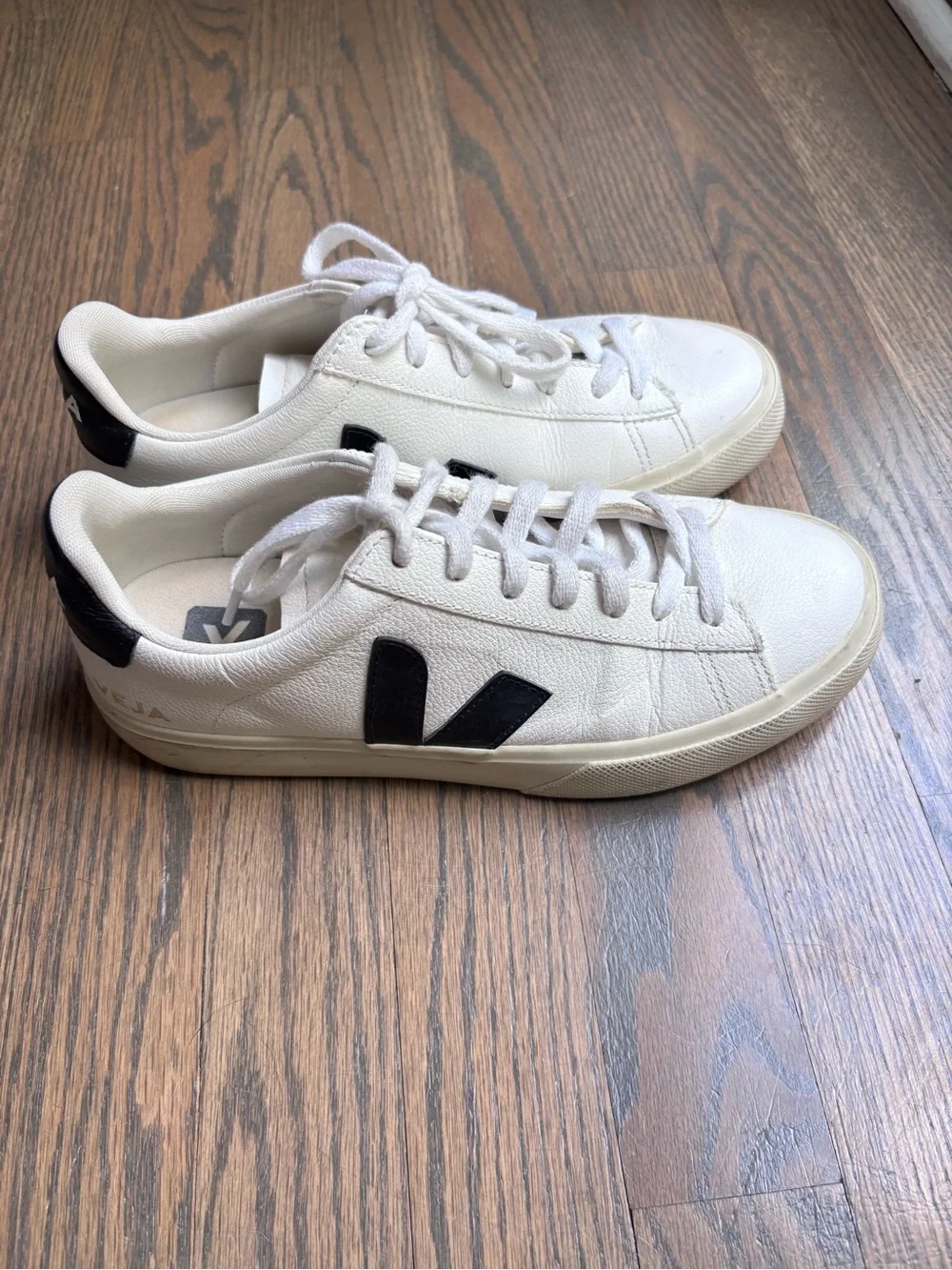 Veja Women’s V-10 Leather Sneaker in White with Black Accents